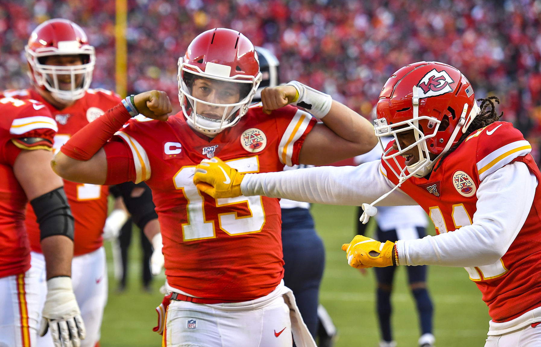 Kansas City Chiefs quarterback Patrick Mahomes (15) celebrates his 27-yard touchdown run late in the second quarter against the Tennessee Titans during the AFC championship game on January 19, 2020, at Arrowhead Stadium in Kansas City, Mo.